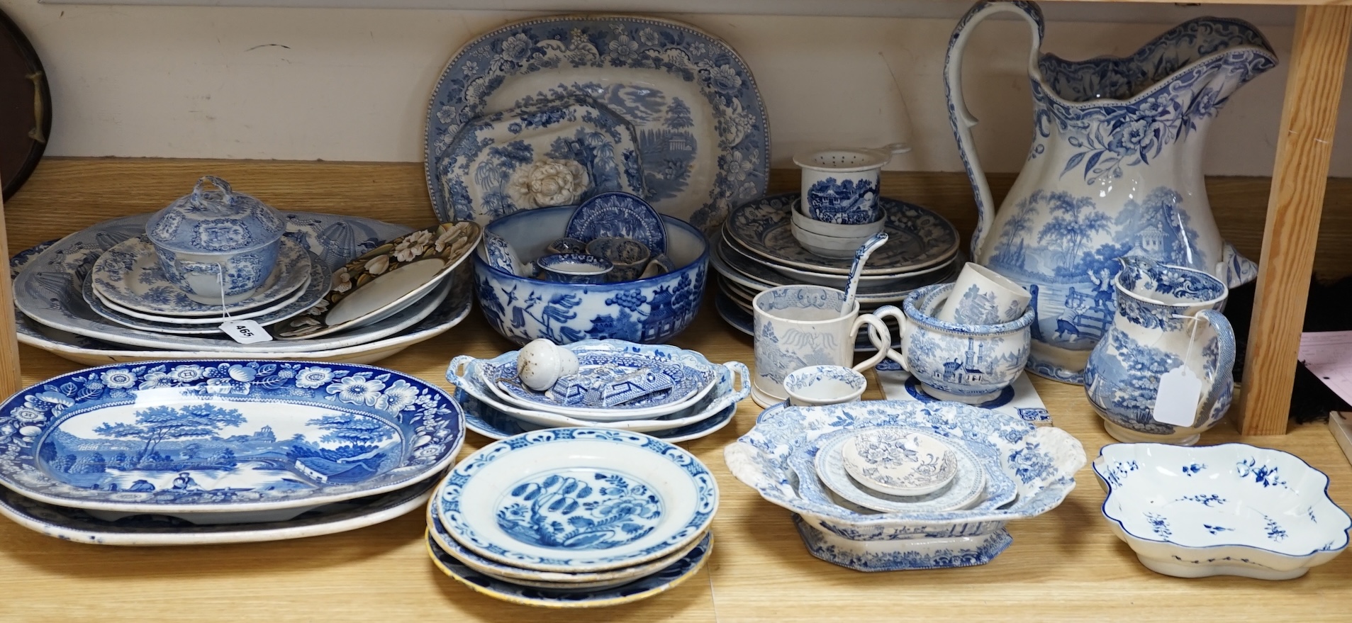 A collection of mixed blue and white dinnerware including Masons Ironstone, mostly plates and jugs. Condition - varies, poor to fair